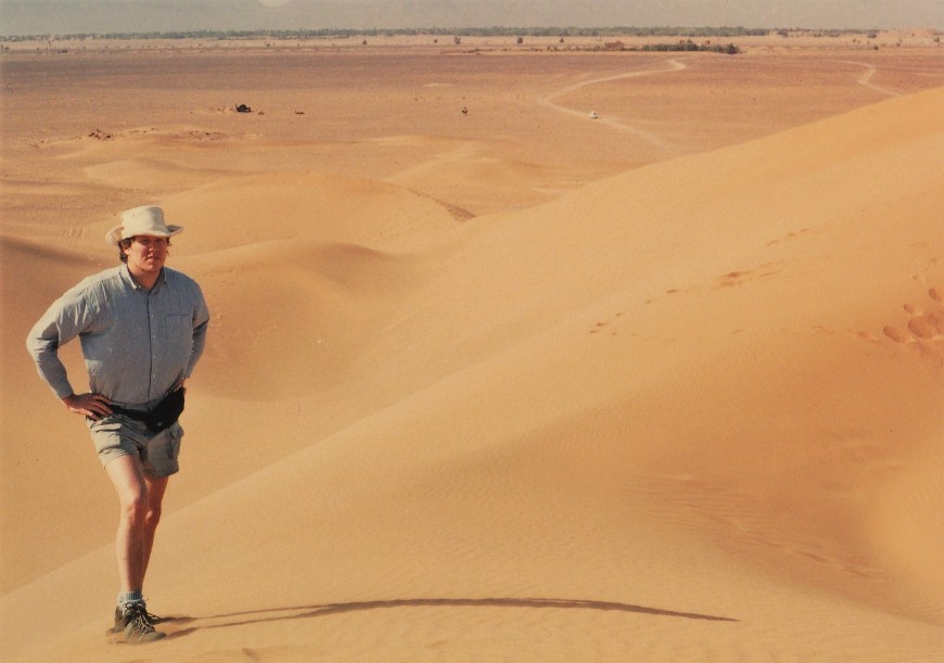 Author Gregory W Beaubien on sand dune in Sahara Desert Morocco 1993